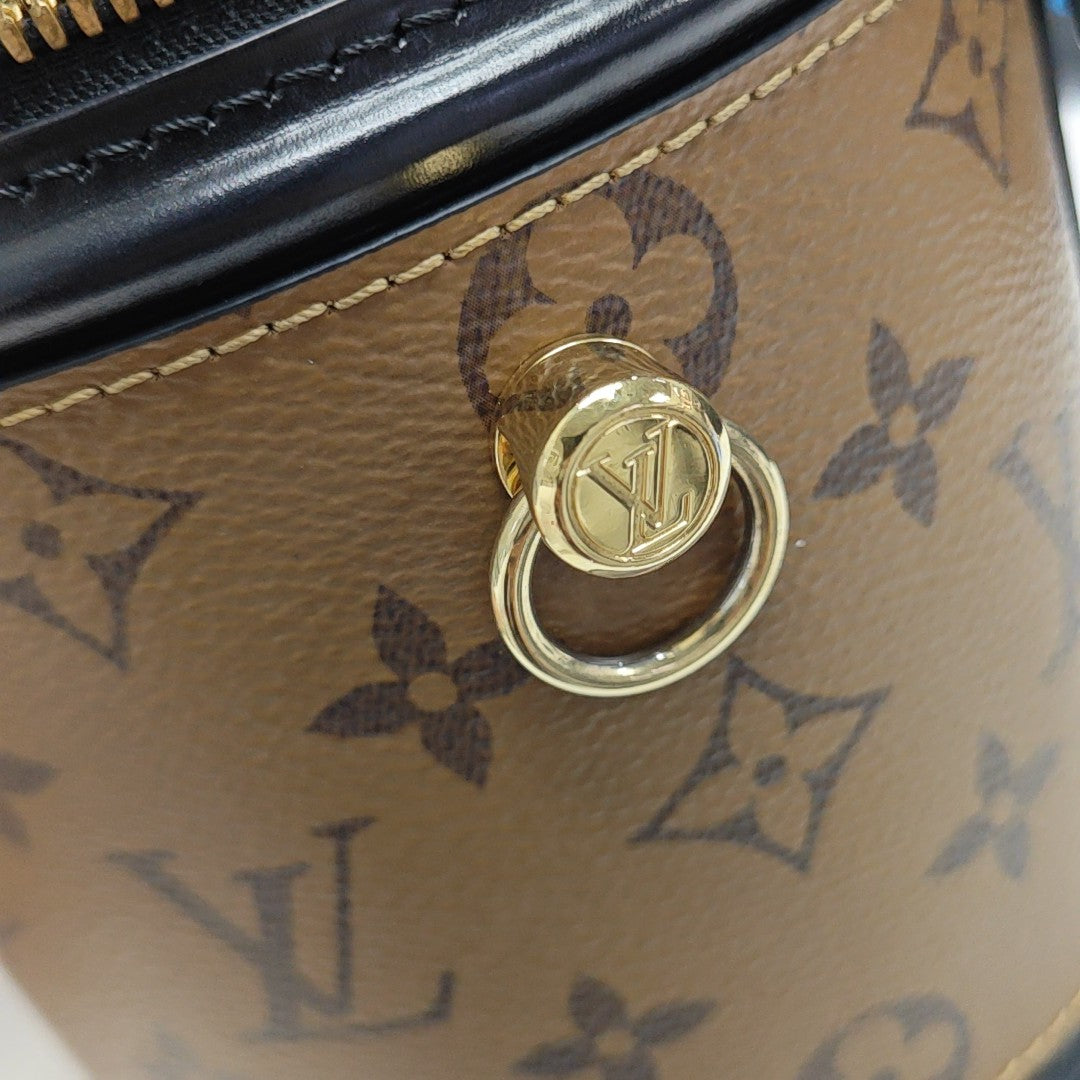 CANNES PM Monogram Coated Canvas Brown