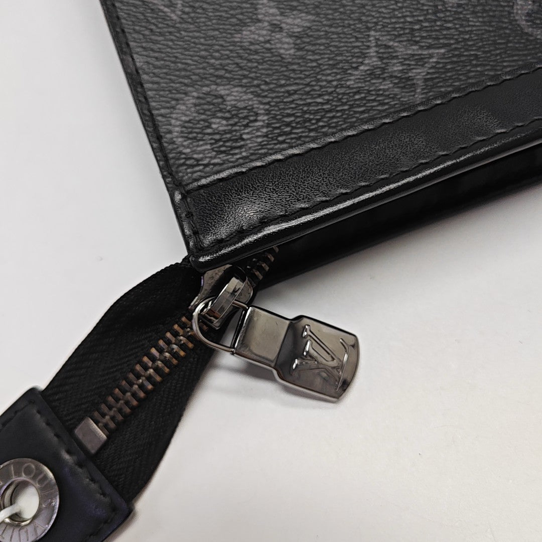 Pochette Voyag MM Monogram Coated Canvas Black