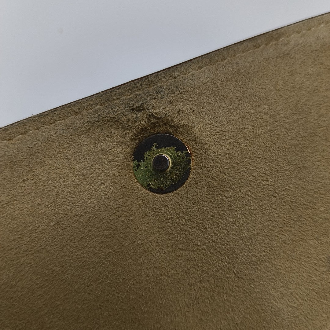 TWIN GM Monogram Coated Canvas Brown