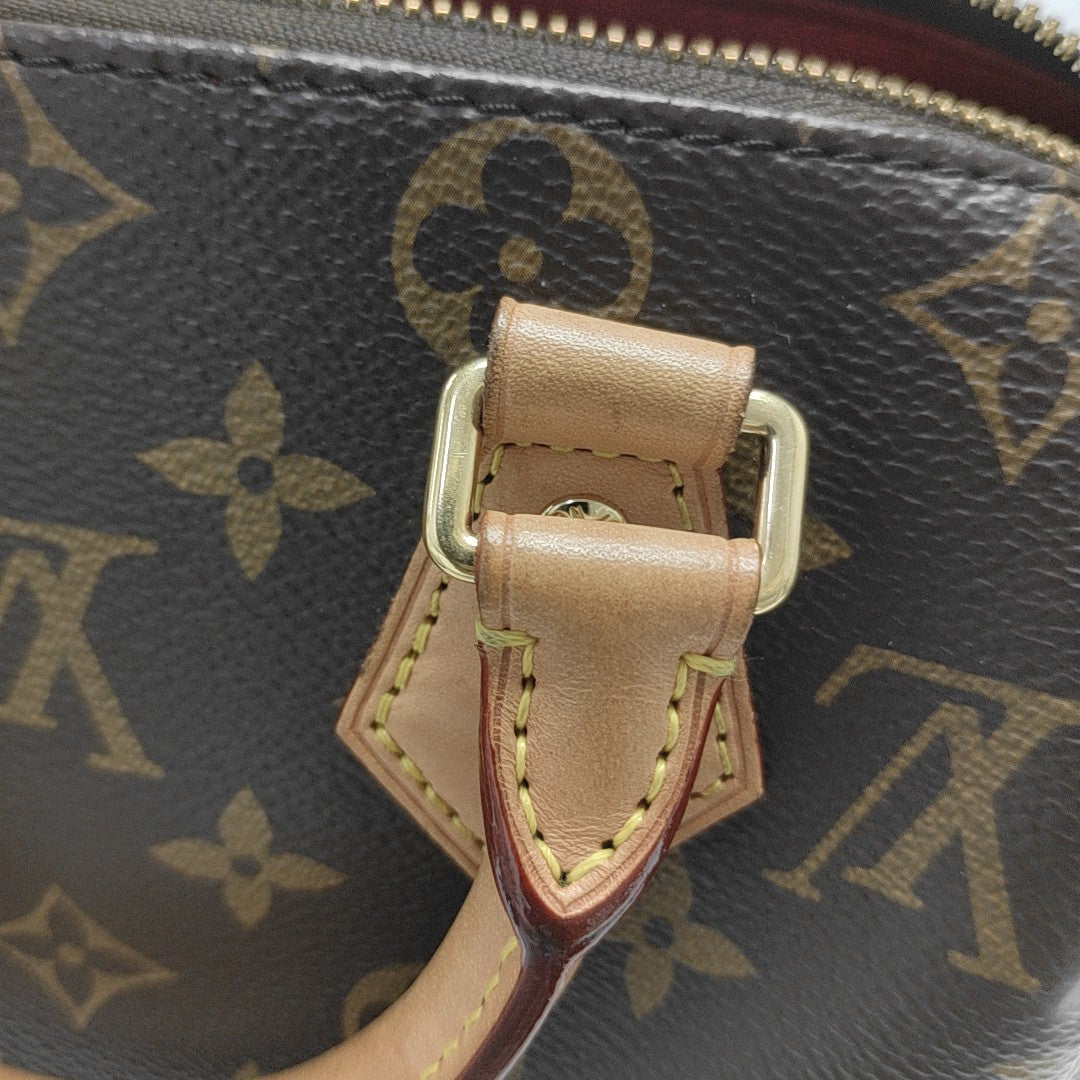 SPEEDY 20 Monogram Coated Canvas Brown