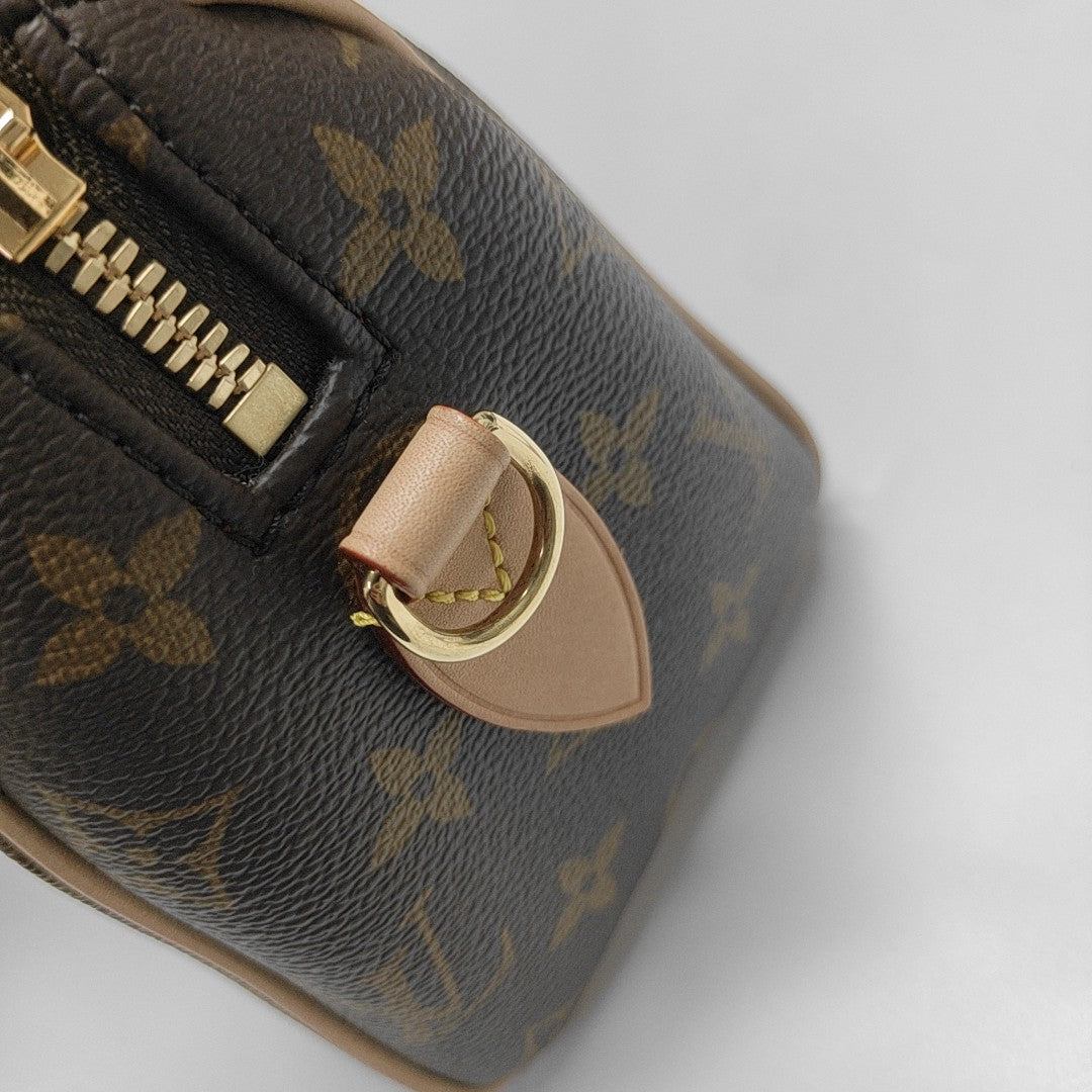 SPEEDY 20 Monogram Coated Canvas Brown