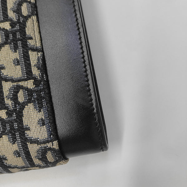 Oblique Canvas Clutch Blue