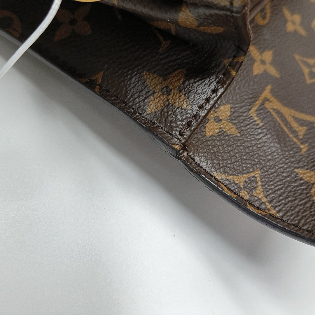 MÉTIS MM Monogram Coated Canvas Brown
