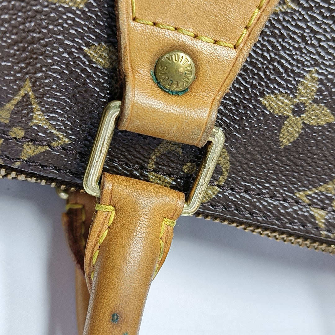 SPEEDY 25 Monogram Coated Canvas Brown