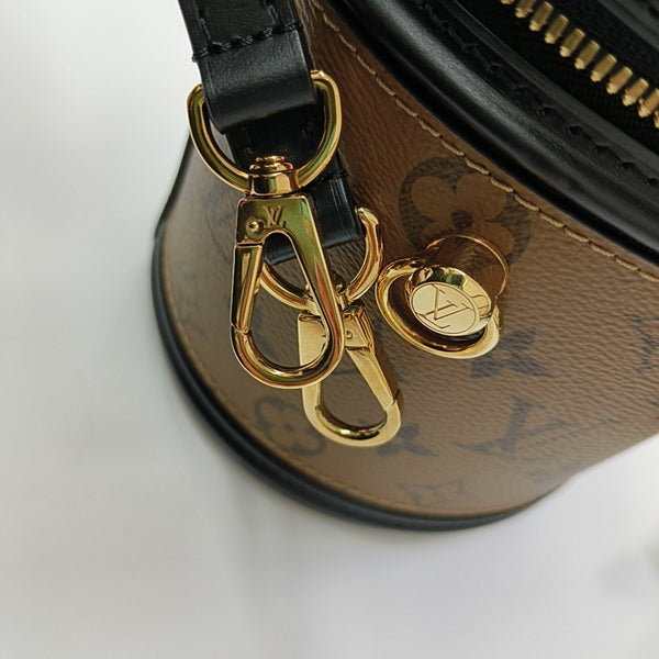 CANNES PM Monogram Coated Canvas Brown