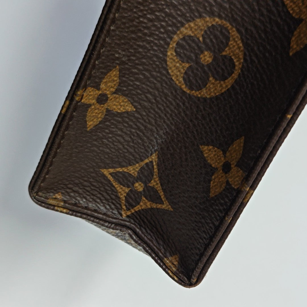TOILET POCKET 19 Monogram Coated Canvas Brown