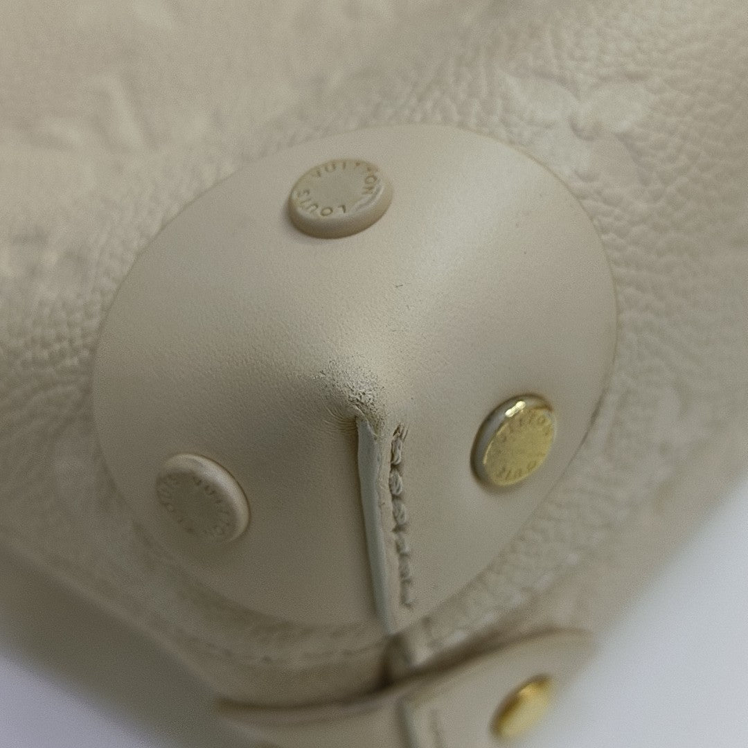 PETITE MALLE Monogram Calfskin Beige