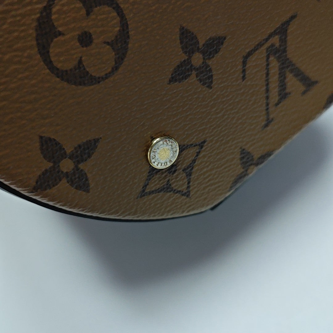 CANNES PM Monogram Coated Canvas Brown