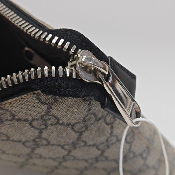 Monogram Coated Canvas Clutch Brown