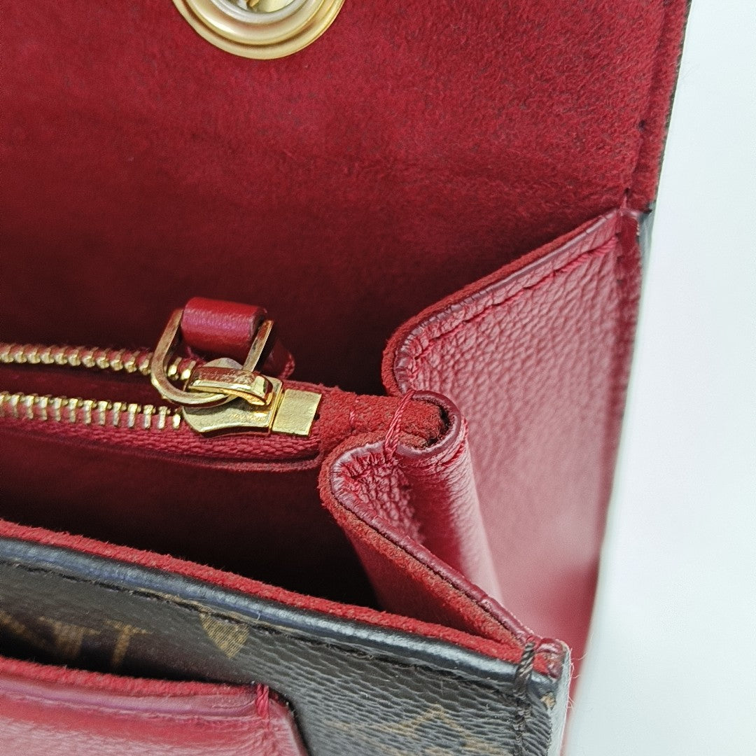VICTOIRE Monogram Coated Canvas Brown