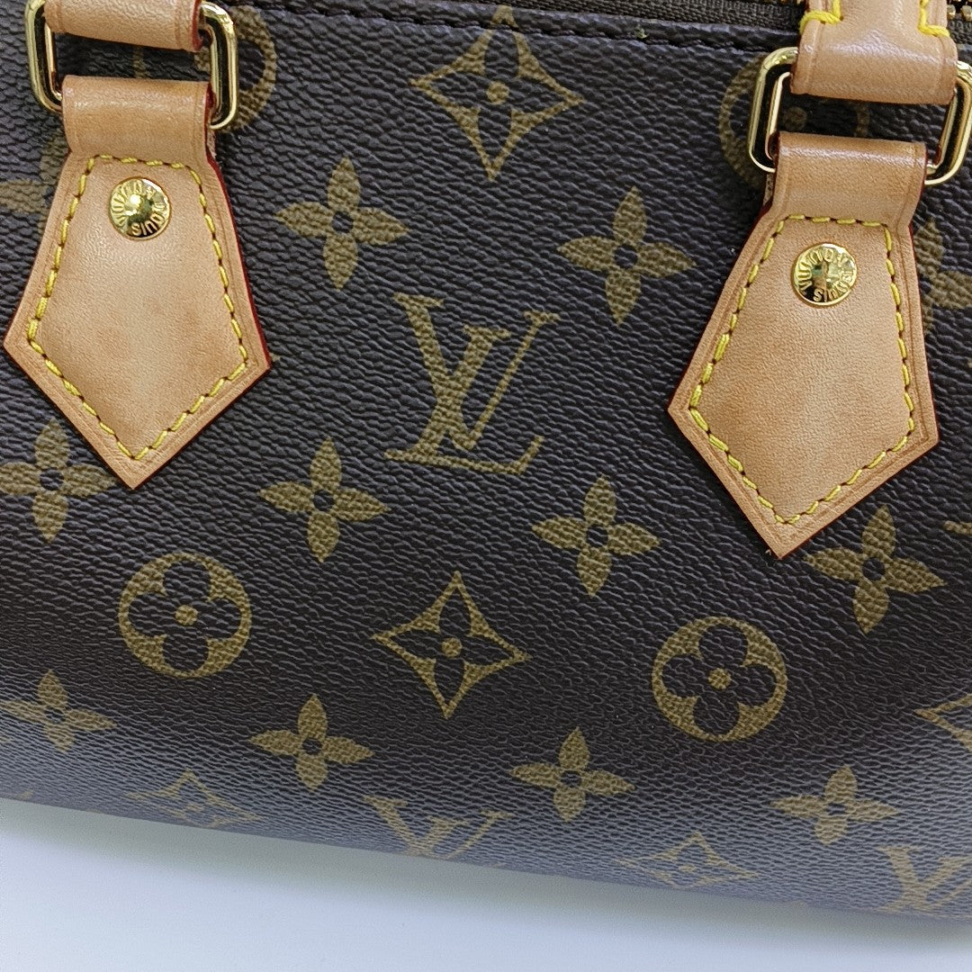 SPEEDY 20 Monogram Coated Canvas Brown