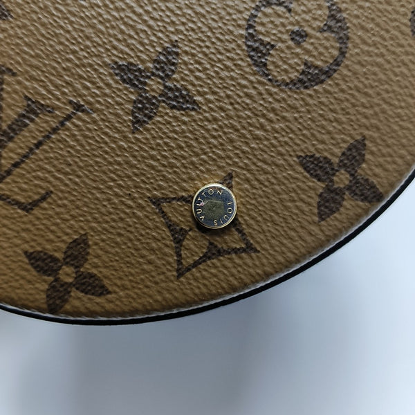 CANNES PM Monogram Coated Canvas Brown