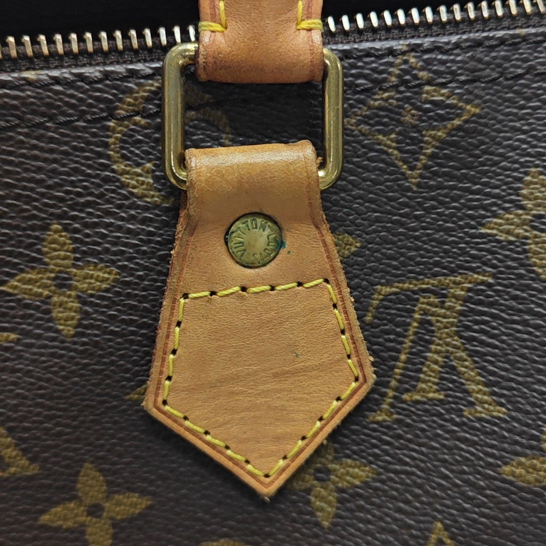 SPEEDY 25 Monogram Coated Canvas Brown