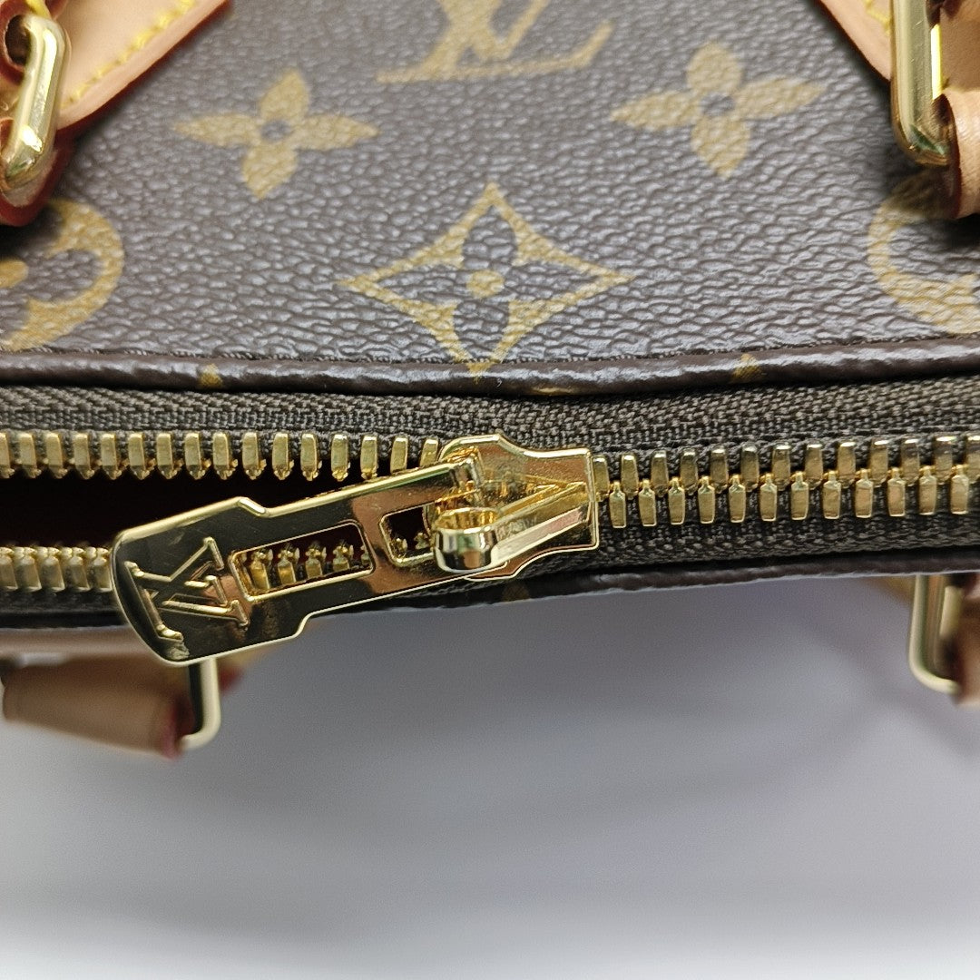 SPEEDY 20 Monogram Coated Canvas Brown