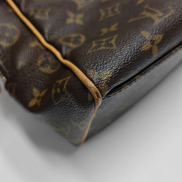 MANHATTAN PM Monogram Coated Canvas Brown