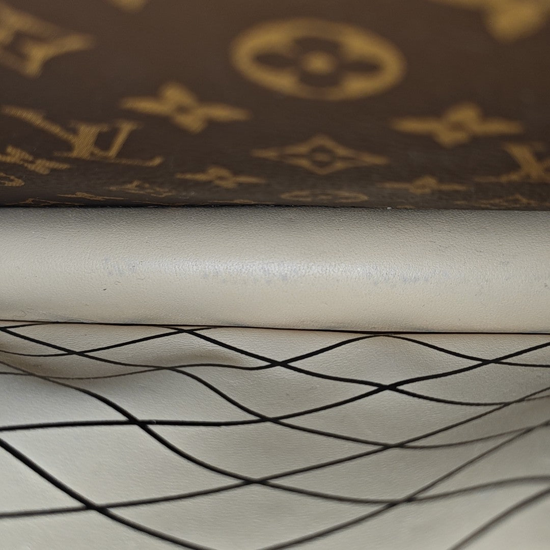 TRUNK Monogram Coated Canvas Brown