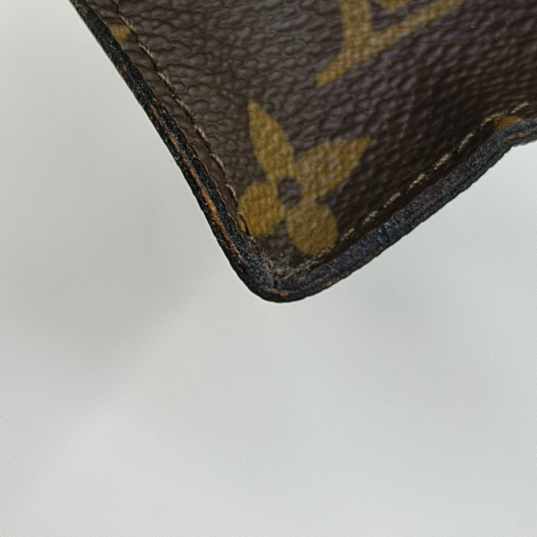 TOILET POCKET Monogram Coated Canvas Brown