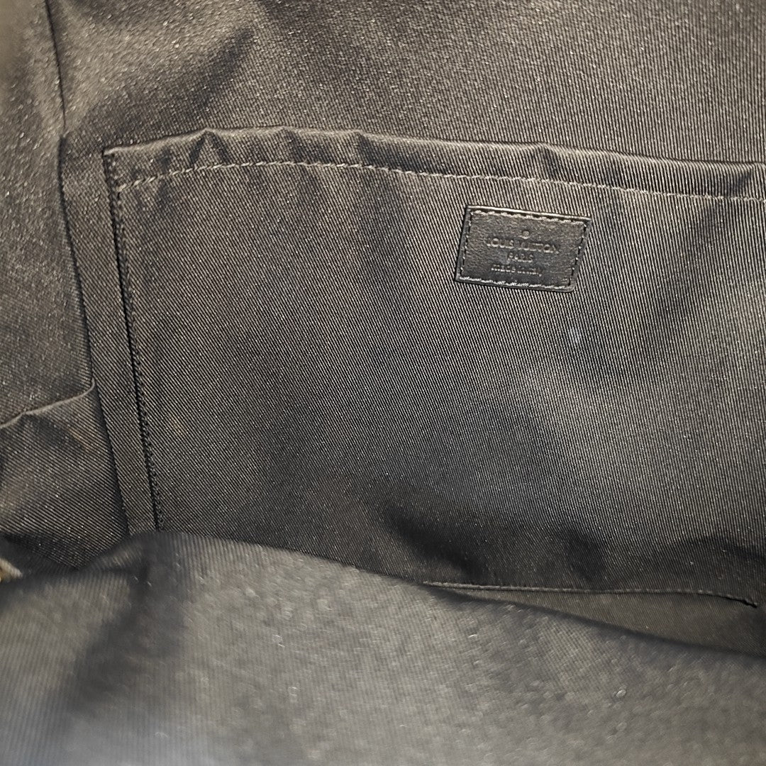Monogram Coated Canvas Backpack Brown
