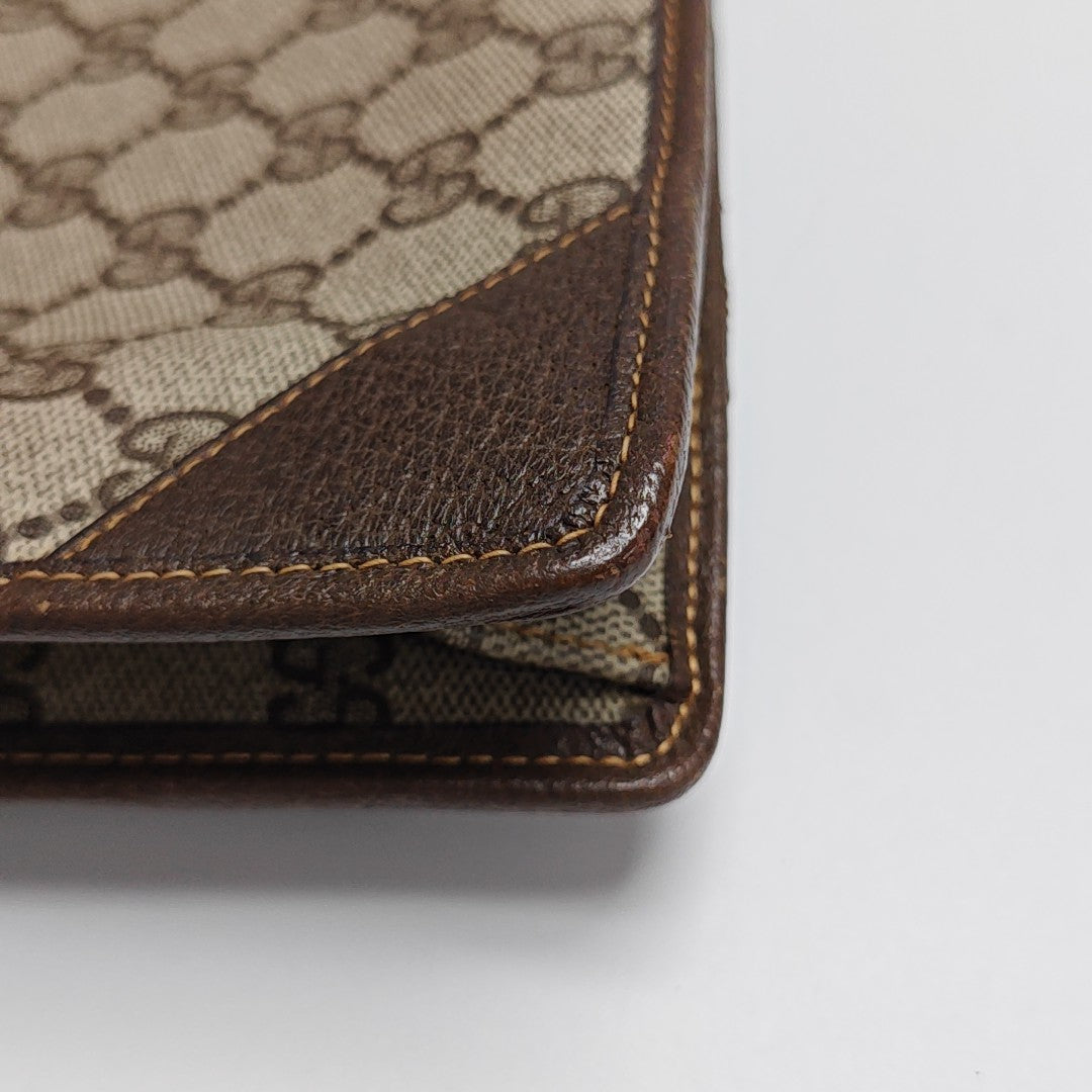 Monogram Coated Canvas Clutch Beige