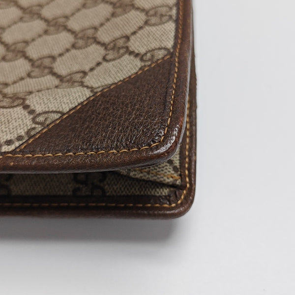 Monogram Coated Canvas Clutch Beige