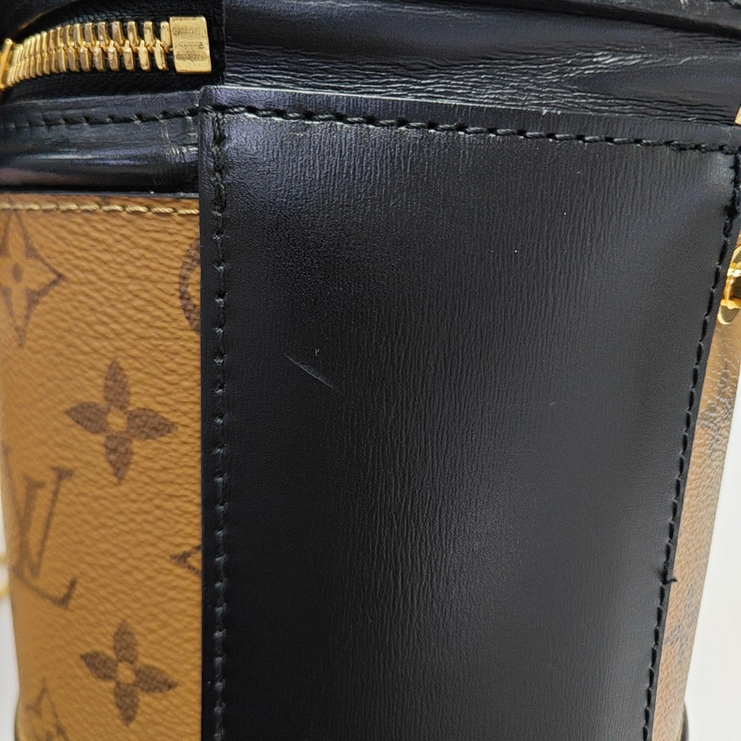 CANNES PM Monogram Coated Canvas Brown