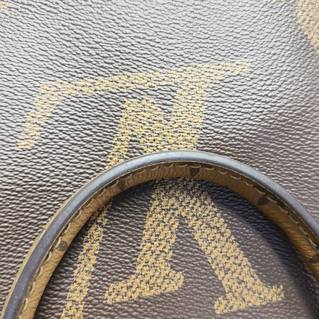 ONTHEGO MM Monogram Coated Canvas Brown