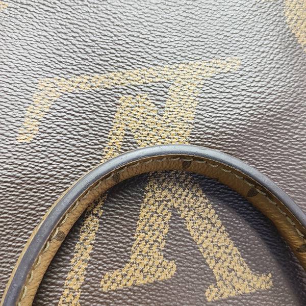 ONTHEGO MM Monogram Coated Canvas Brown