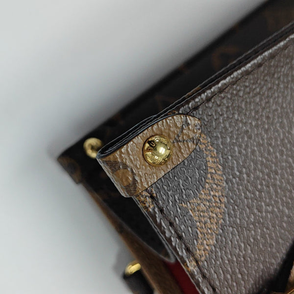 ONTHEGO PM Monogram Coated Canvas Brown