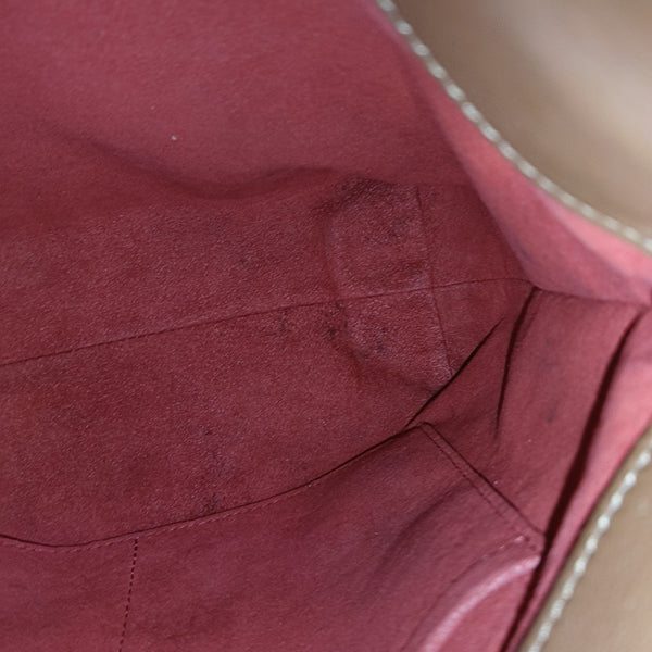 TUILERIES Monogram Coated Canvas Brown
