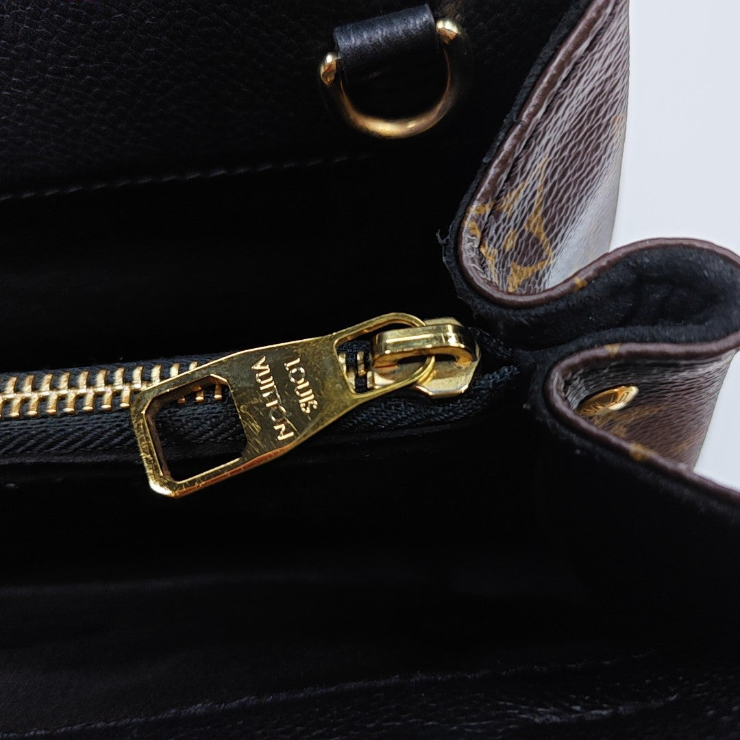 VÉNUS Monogram Coated Canvas Brown