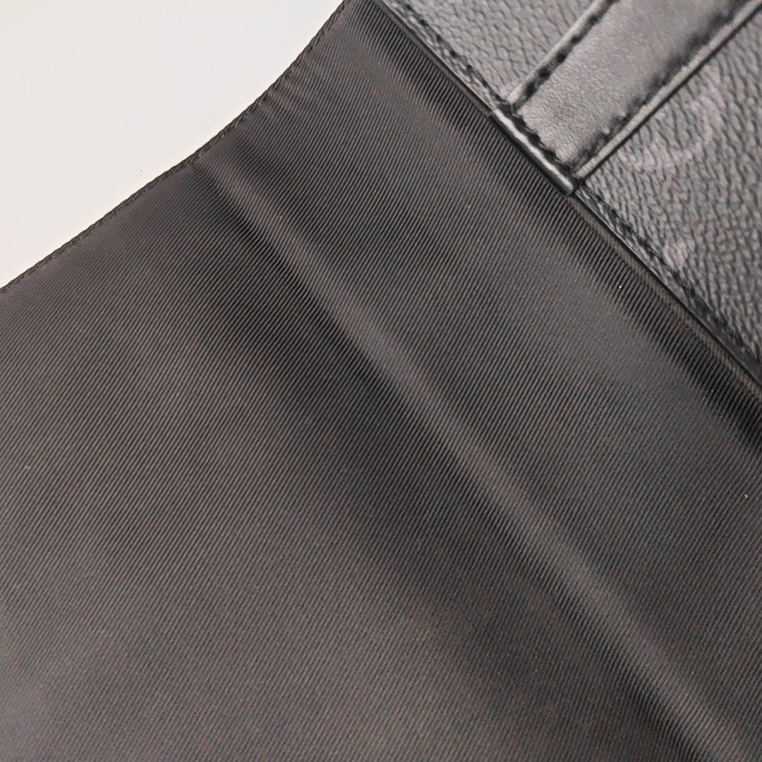 TRUNK PM Monogram Coated Canvas Black