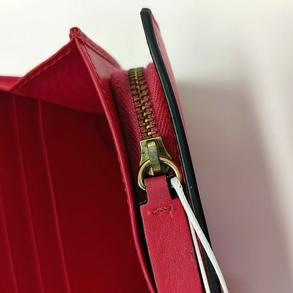 Authenticated pre-owned  Rockstud Calfskin Red Wallet - Wallet at Looply