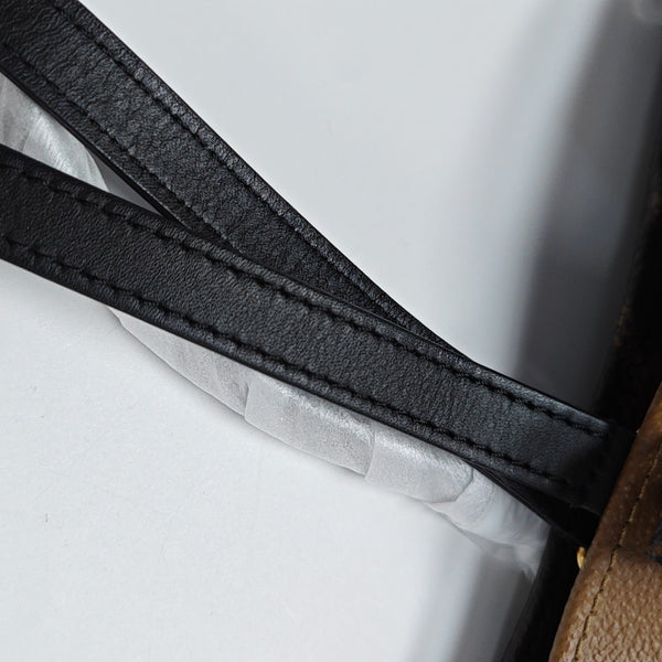 ONTHEGO MM Monogram Coated Canvas Brown
