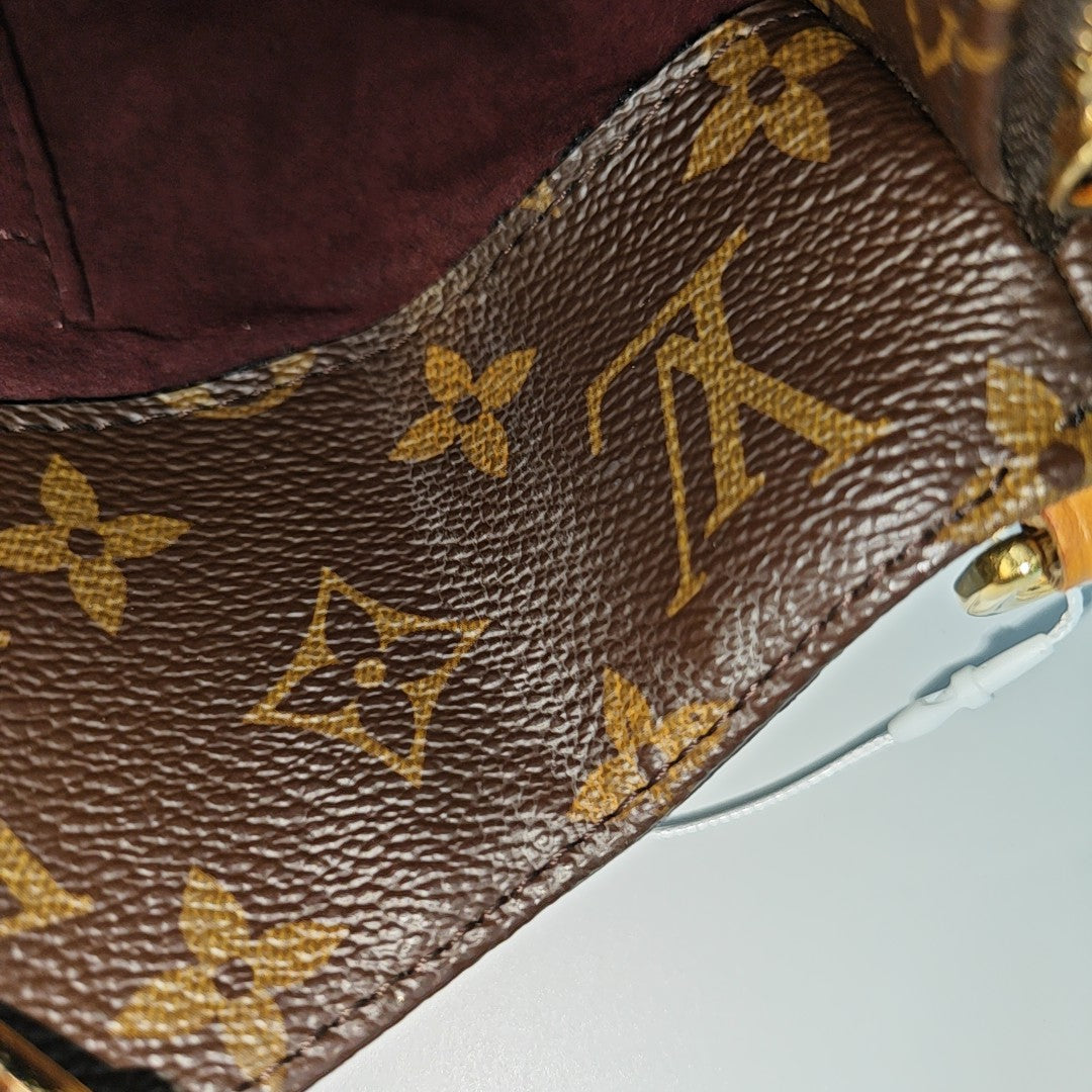 MONTAIGNE MM Monogram Coated Canvas Brown