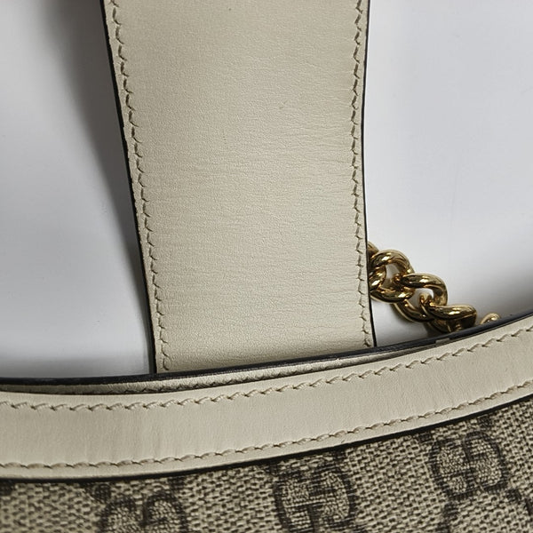 Padlock Small Monogram Coated Canvas Beige