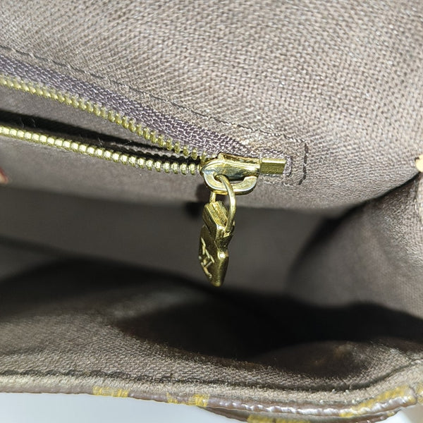 MENILMONTANT PM Monogram Coated Canvas Brown