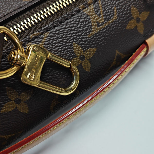 MÉTIS EAST WEST Monogram Coated Canvas Brown