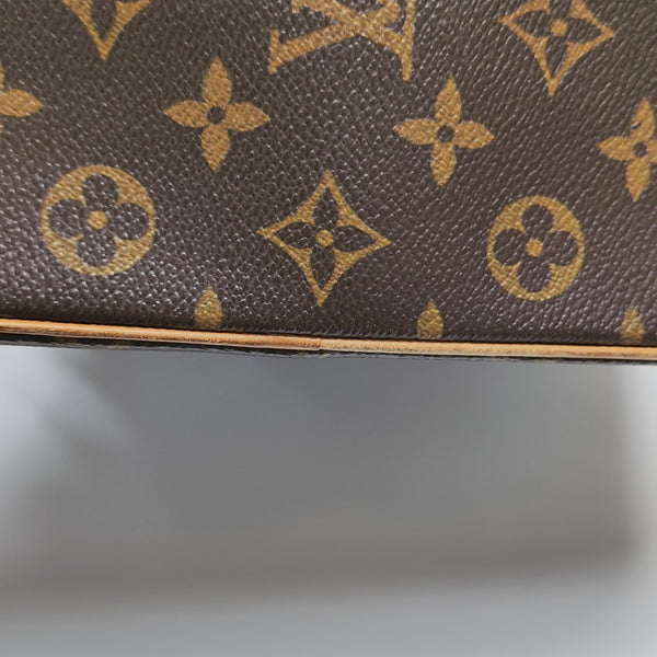 EXCENTRI-CITE Monogram Coated Canvas Brown