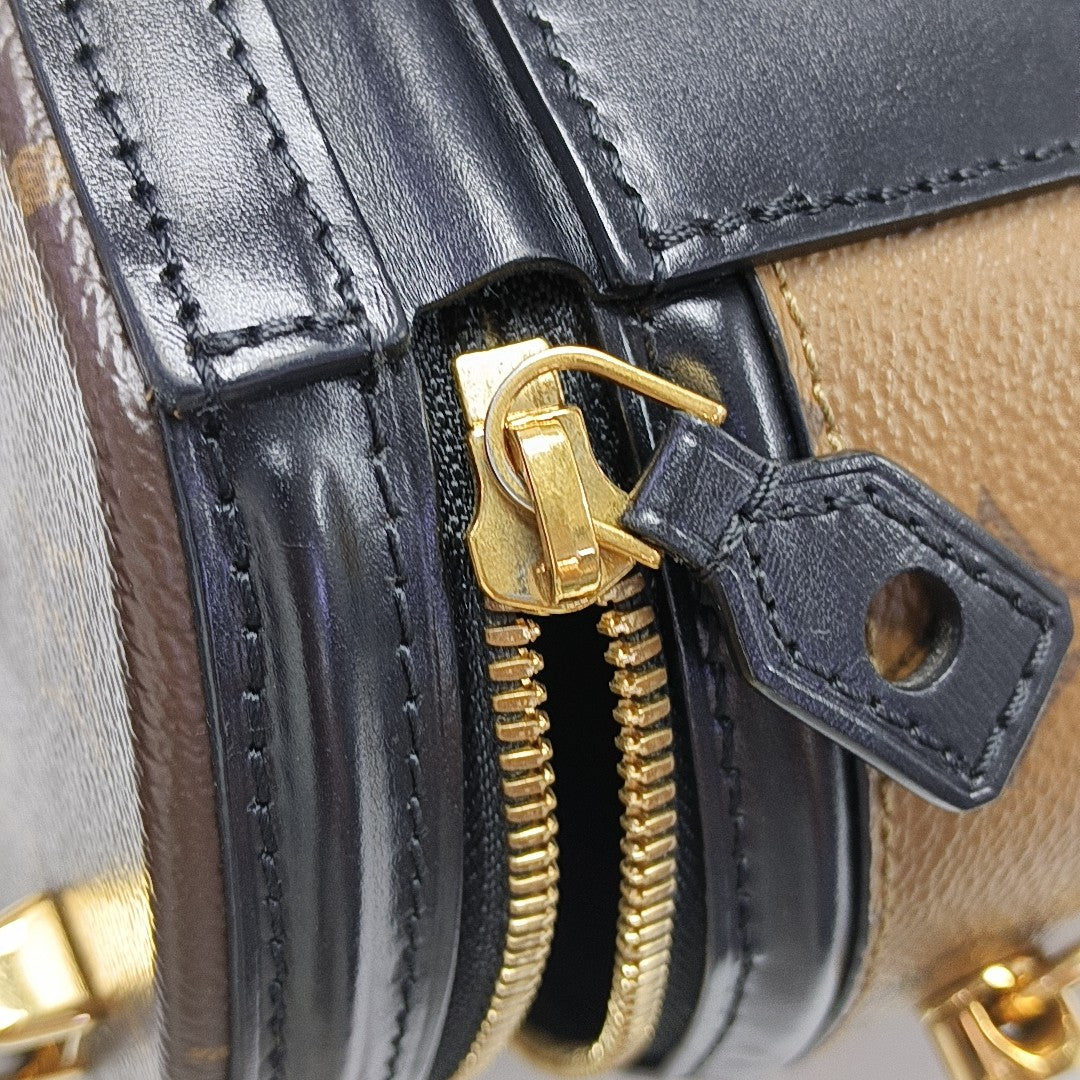 CANNES PM Monogram Coated Canvas Brown