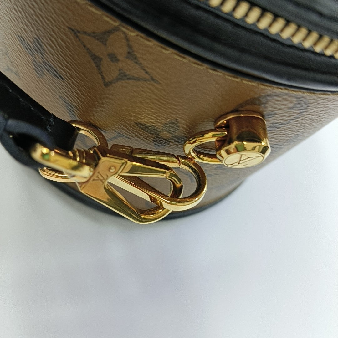 CANNES PM Monogram Coated Canvas Brown