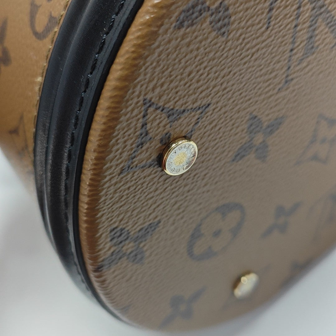 CANNES PM Monogram Coated Canvas Brown