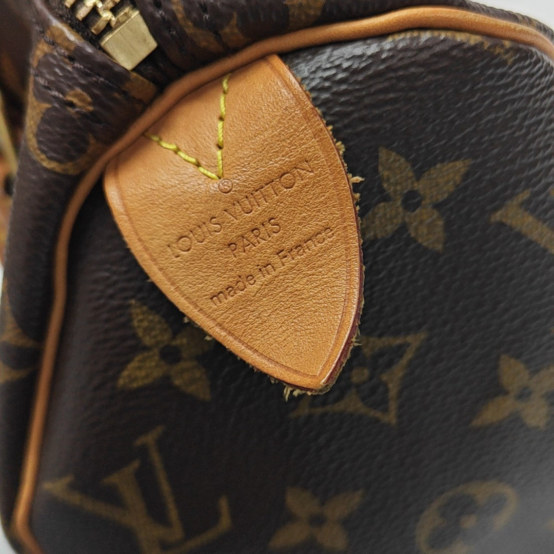 SPEEDY 25 Monogram Coated Canvas Brown