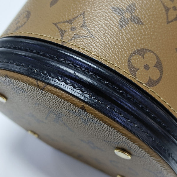 CANNES PM Monogram Coated Canvas Brown