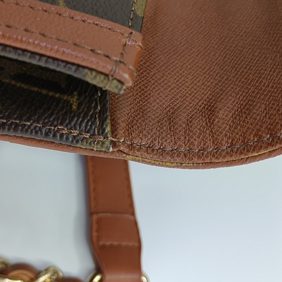 DAME Monogram Coated Canvas Brown