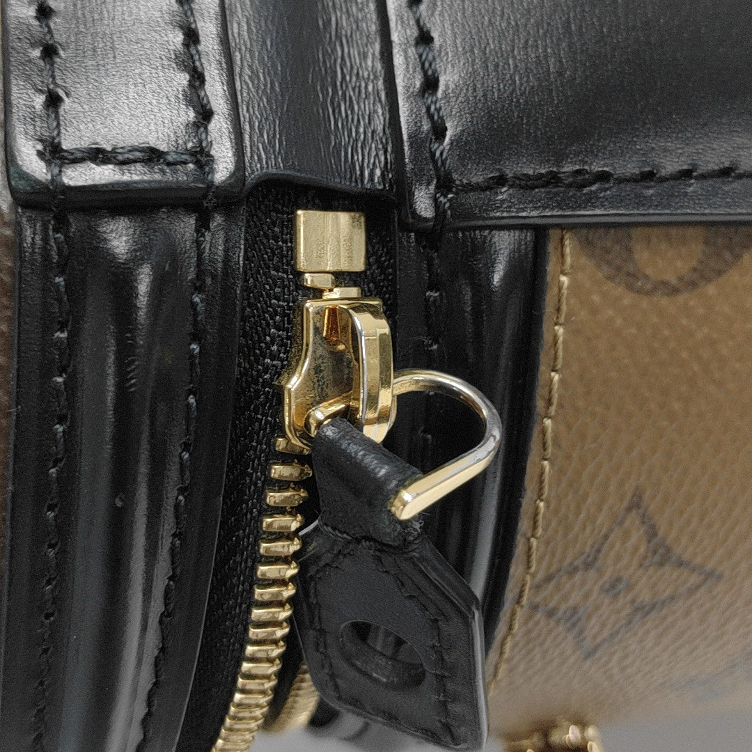 CANNES PM Monogram Coated Canvas Brown