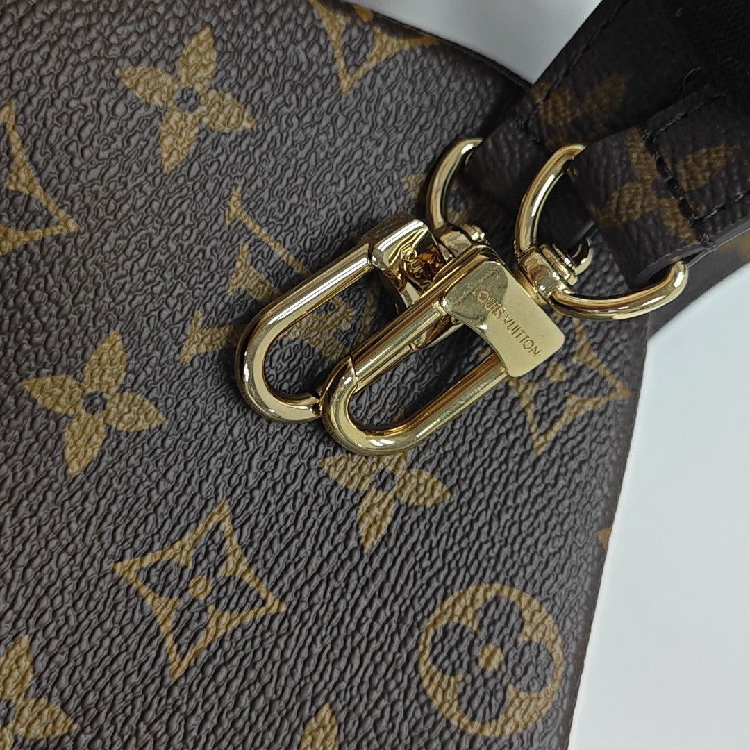 MÉTIS MM Monogram Coated Canvas Brown