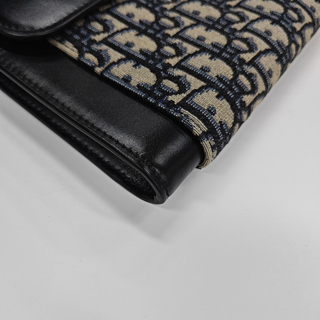 Oblique Canvas Clutch Blue