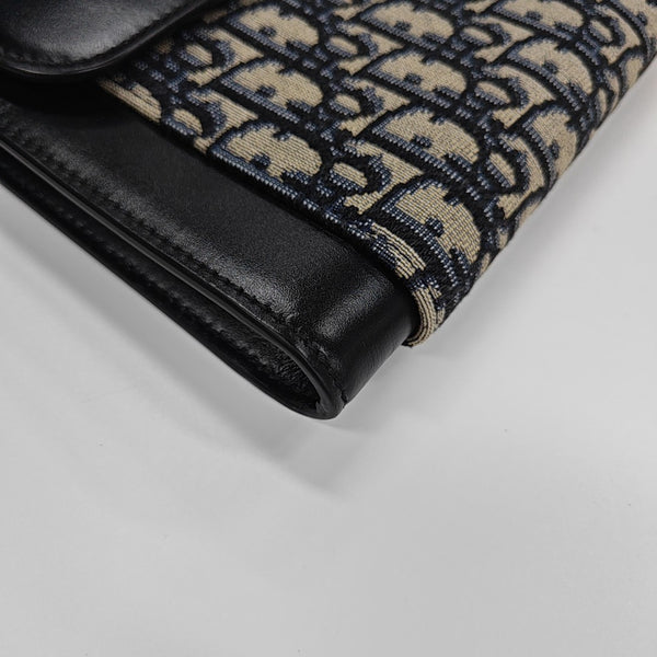 Oblique Canvas Clutch Blue