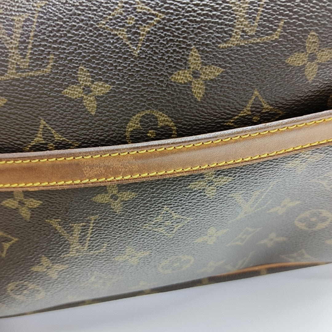 REPORTER PM Monogram Coated Canvas Brown