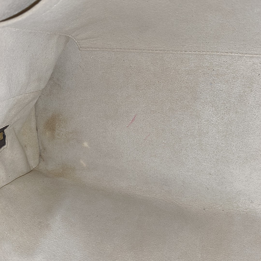MANHATTAN GM Monogram Coated Canvas Brown